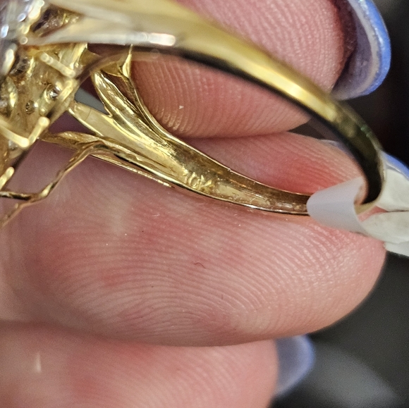 New. 10k tanzanite & diamond ring size 7. Can be resized by a jeweler. Stamped 1 - Picture 4 of 9